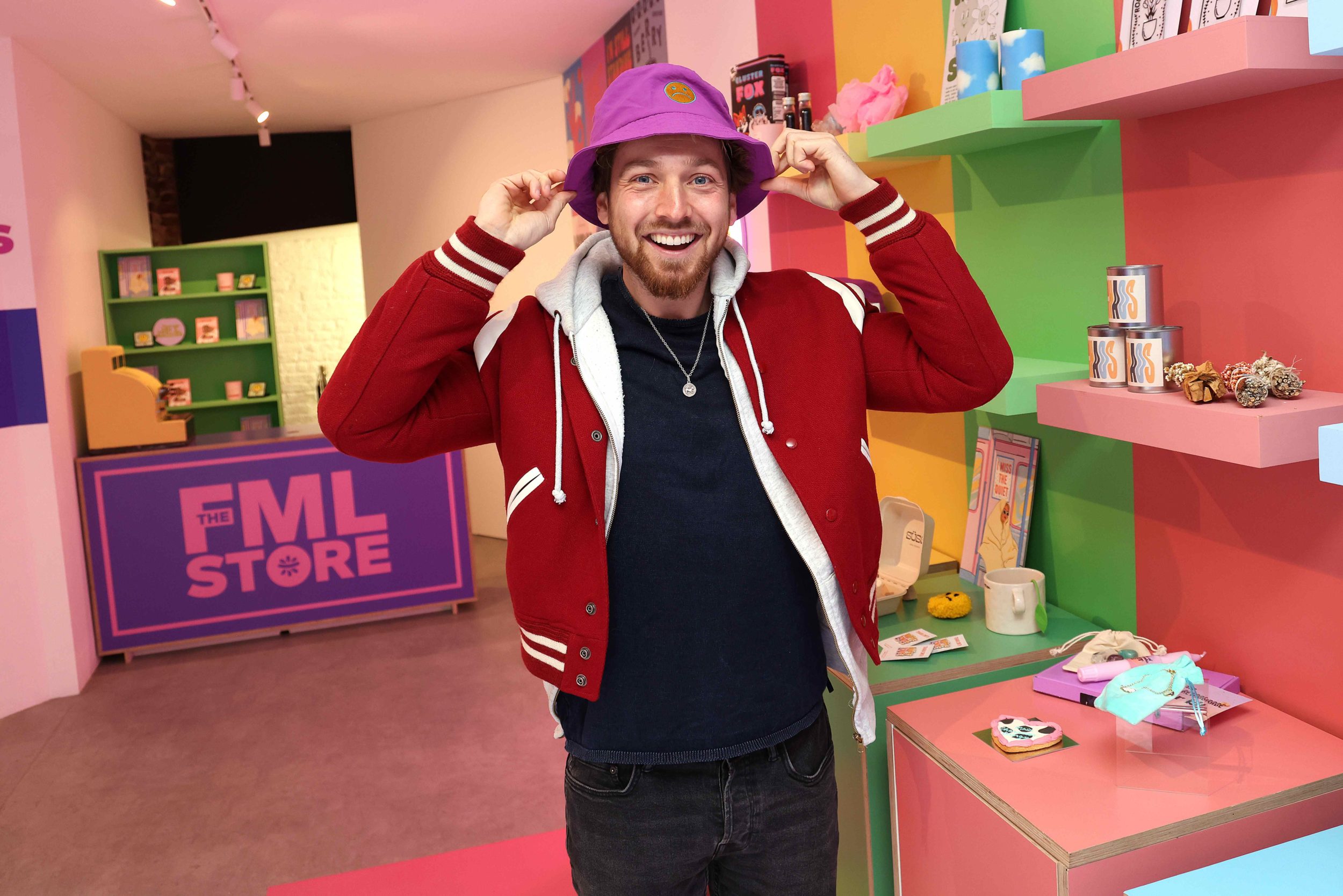 A man in a hat in the NOTHS FML store