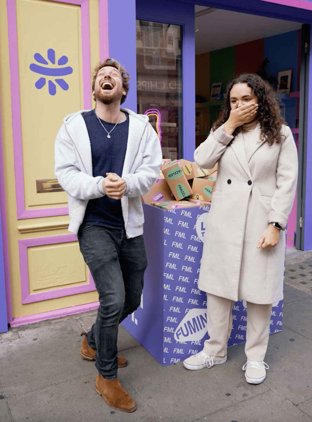 Sam Thompson laughing outside the NOTHS FML store