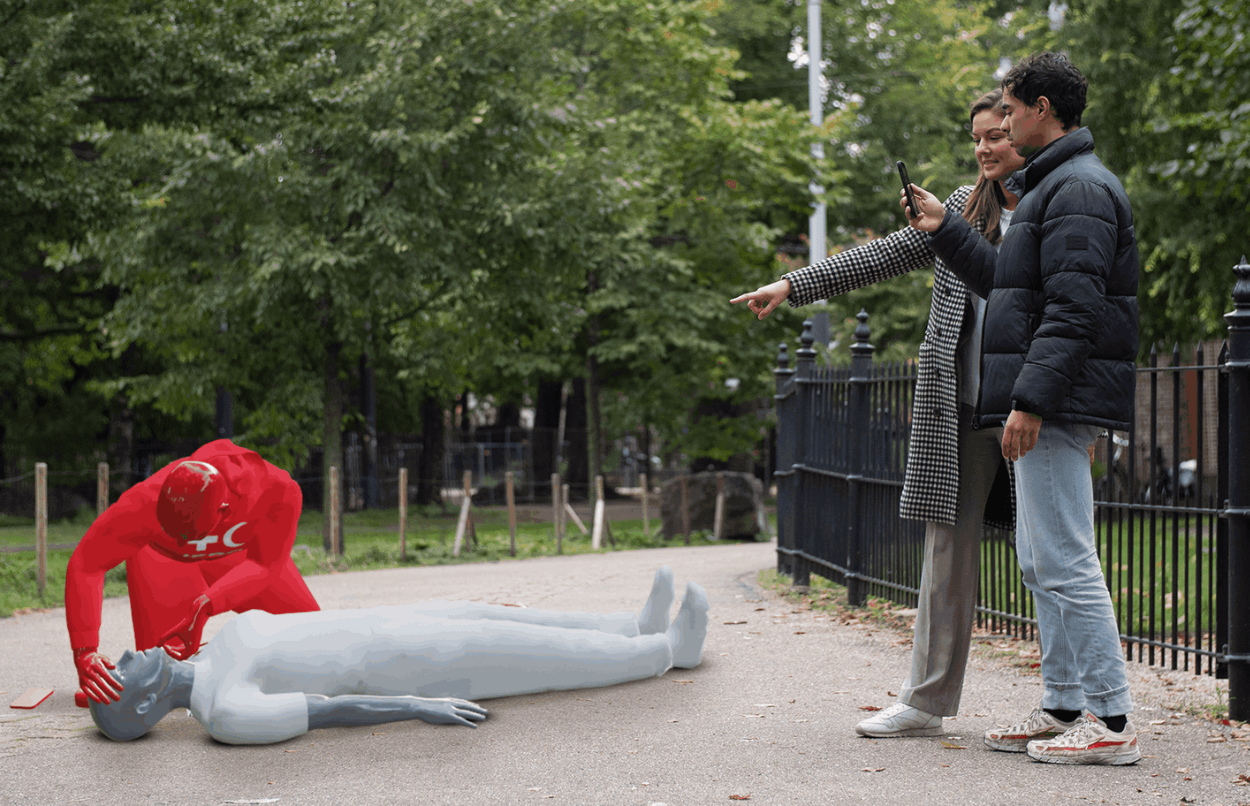 The Snapchat AR lens in action with two people seeing CPR shown