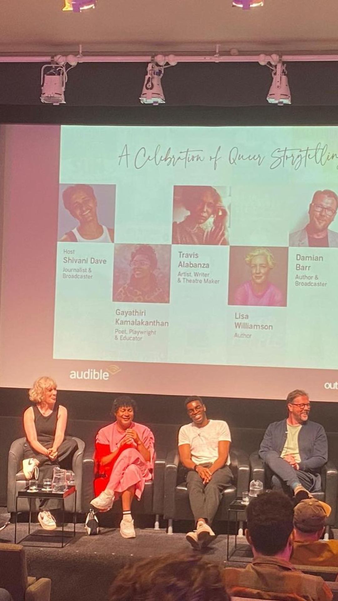 Group of storytellers talking on stage