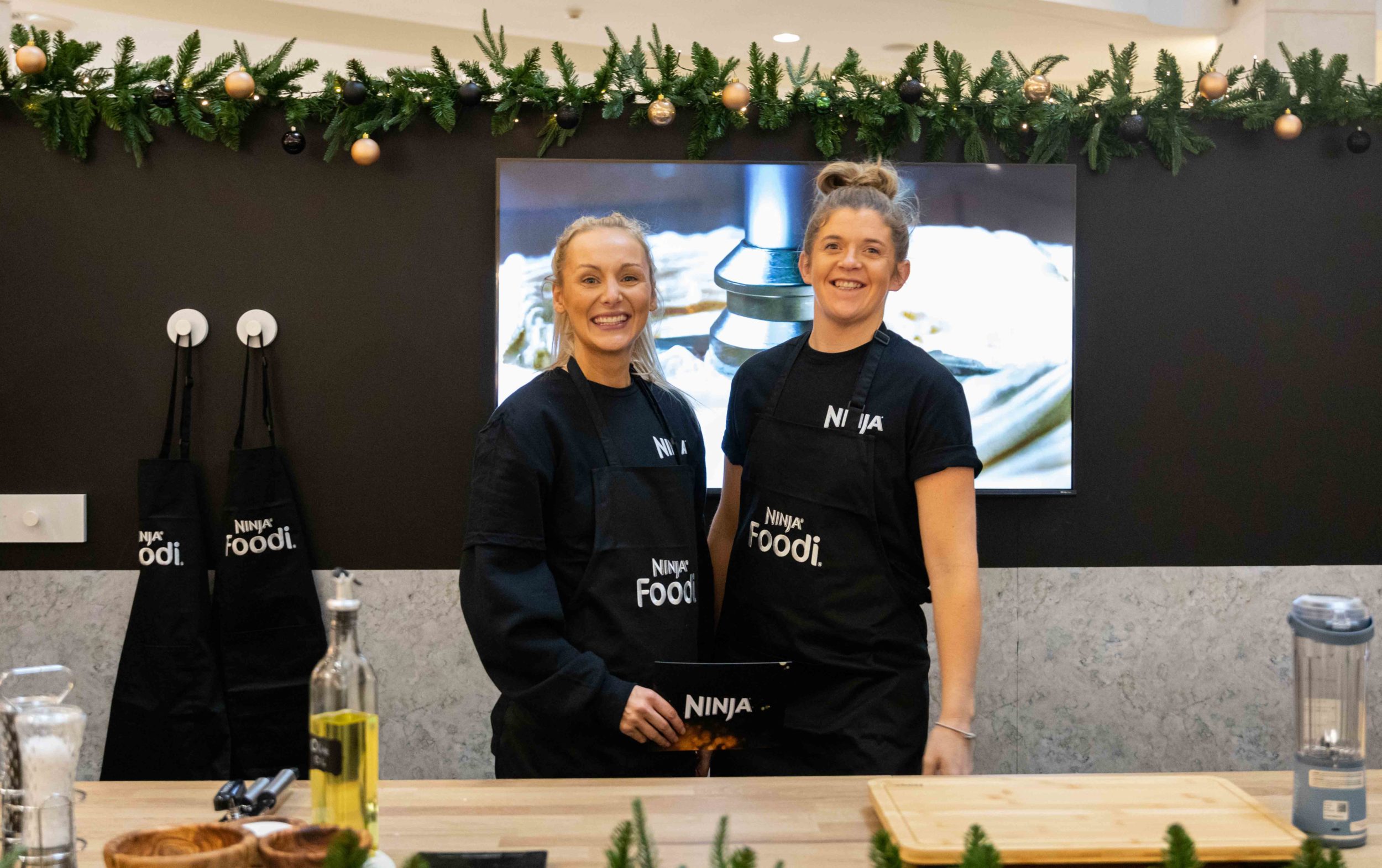 Staff af the Ninja display at a shopping centre